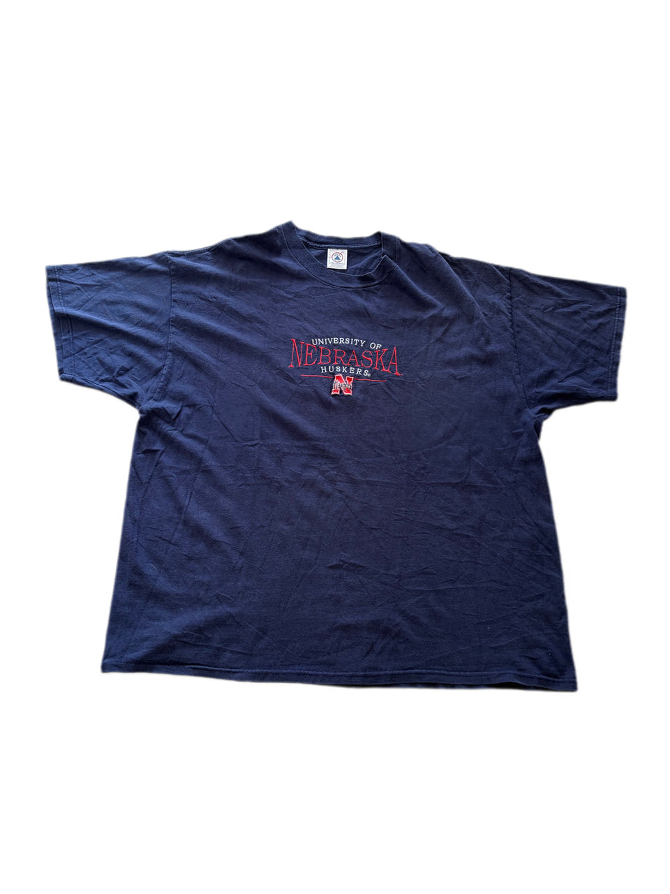 VINTAGE NAVY BLUE UNIVERSITY OF NEBRASKA HUSKERS LOGO TEE